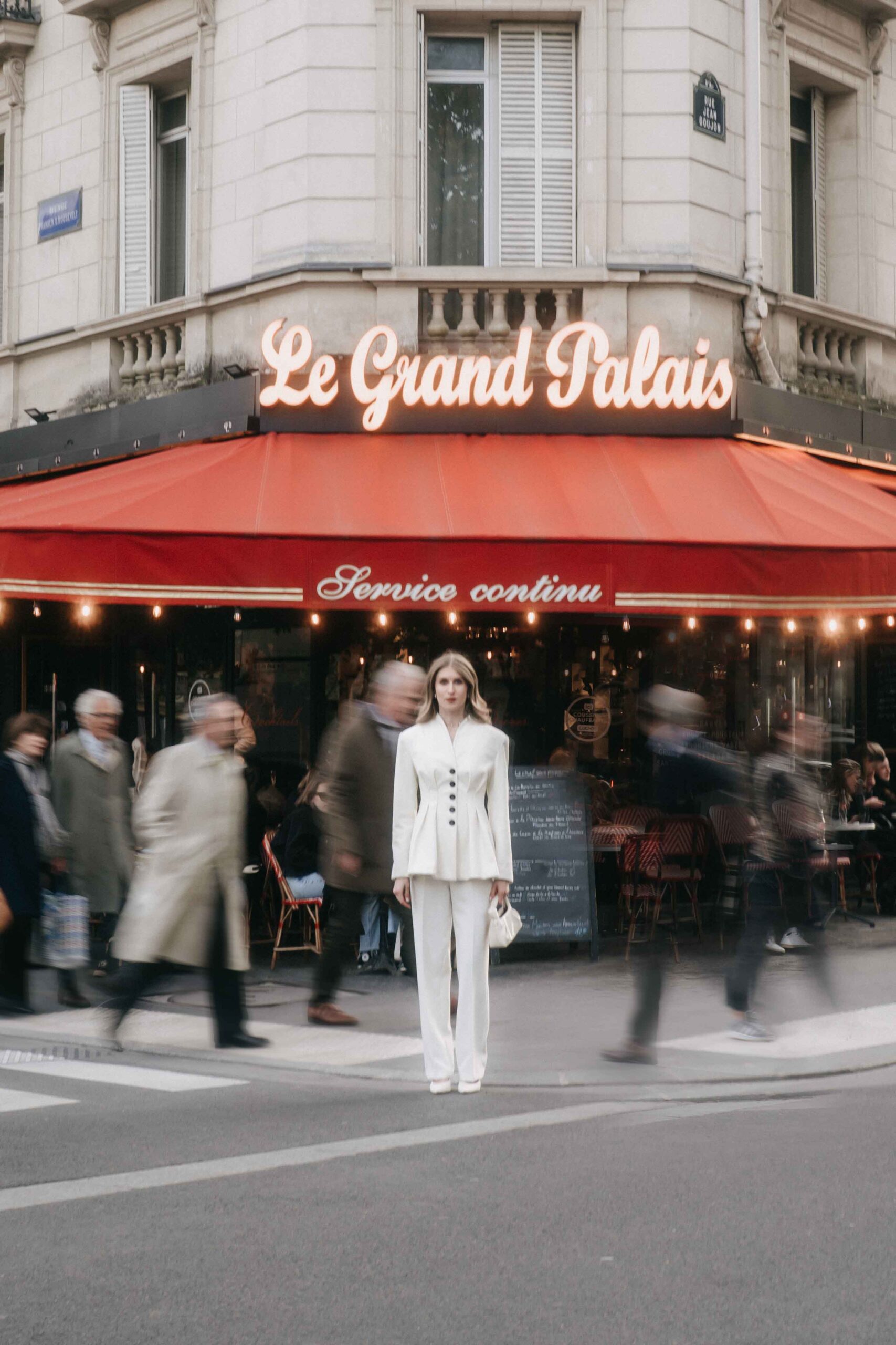 Busy Grand Palais quarter in Paris during a wedding photoshoot.