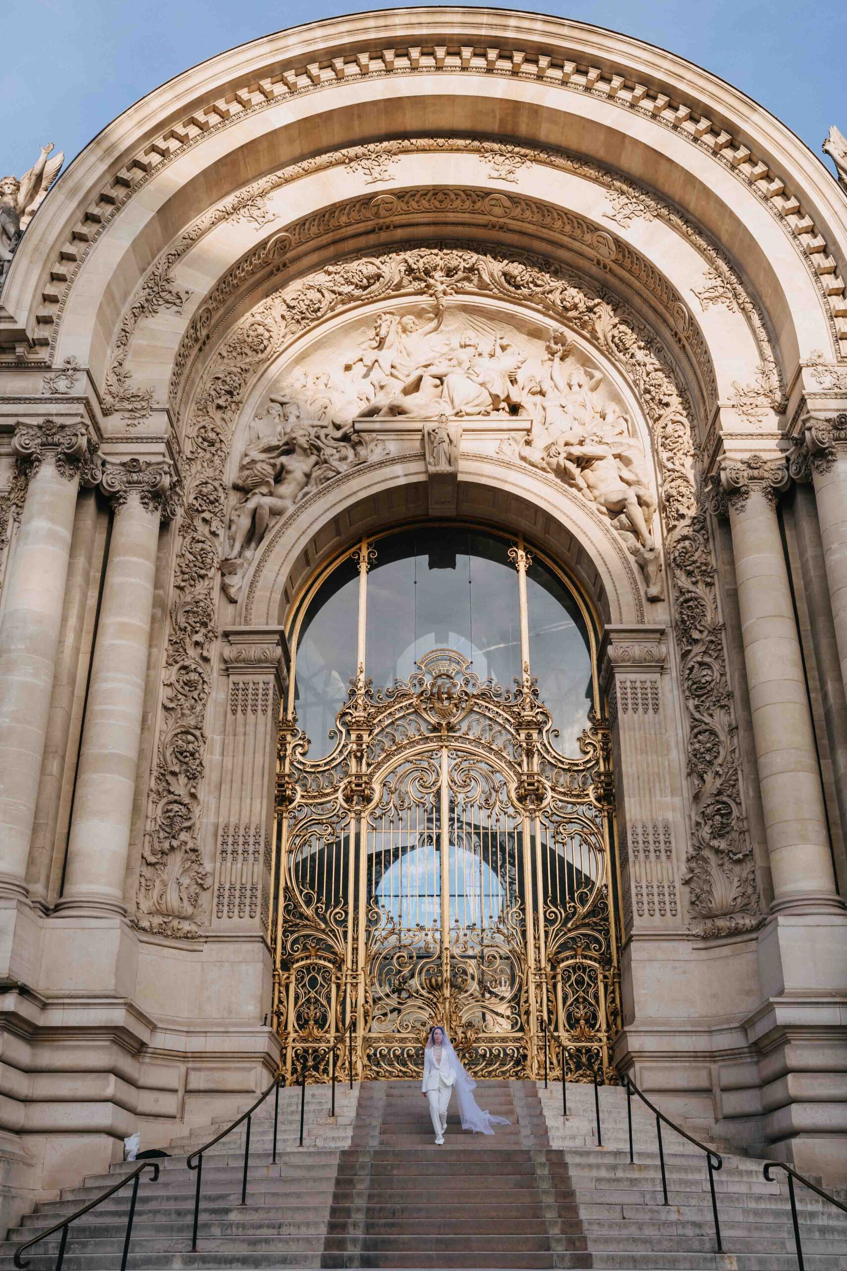 Iconic Paris facade at an early wedding photography permit window.